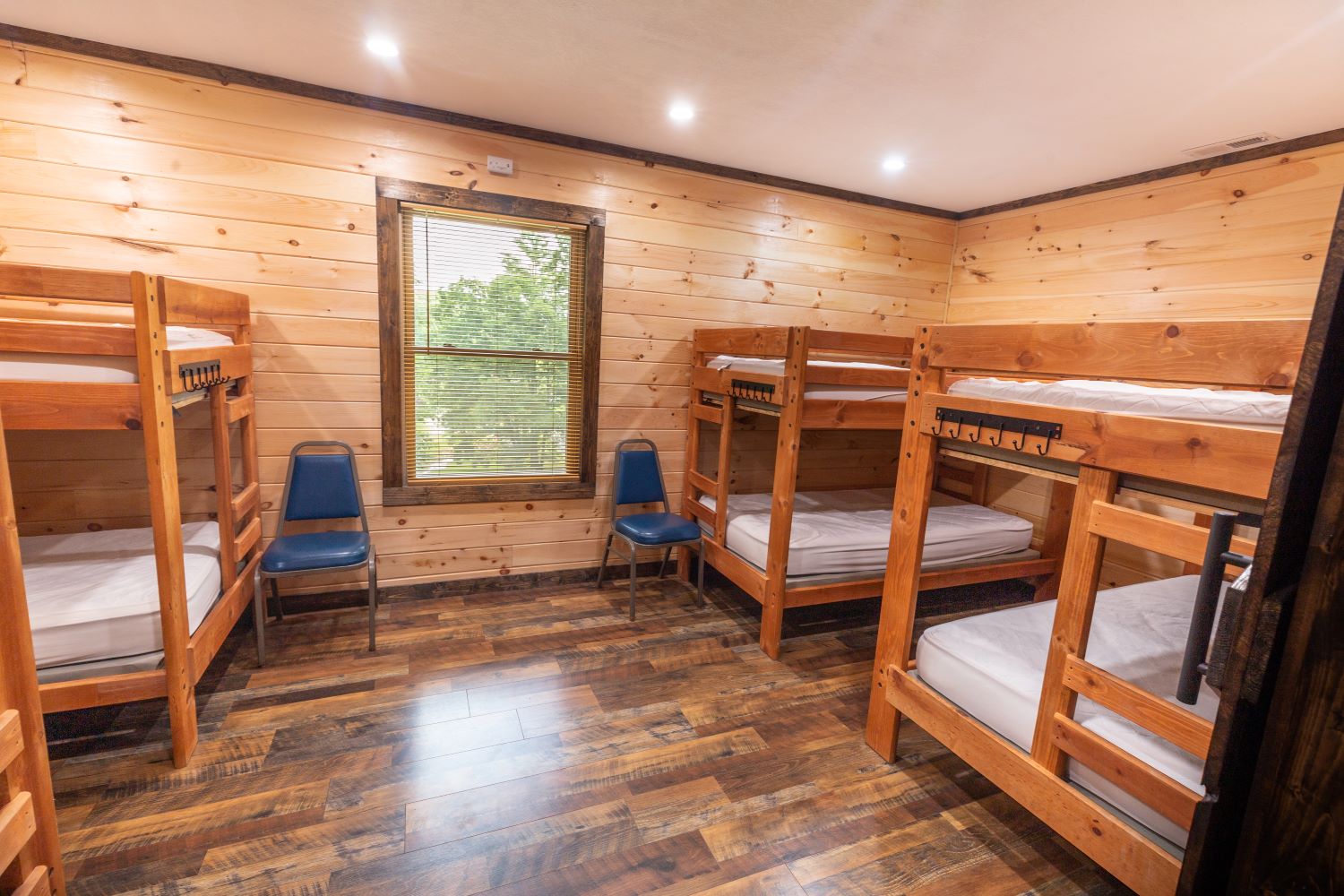 image of bunk beds in small room at bunkhouse cabin