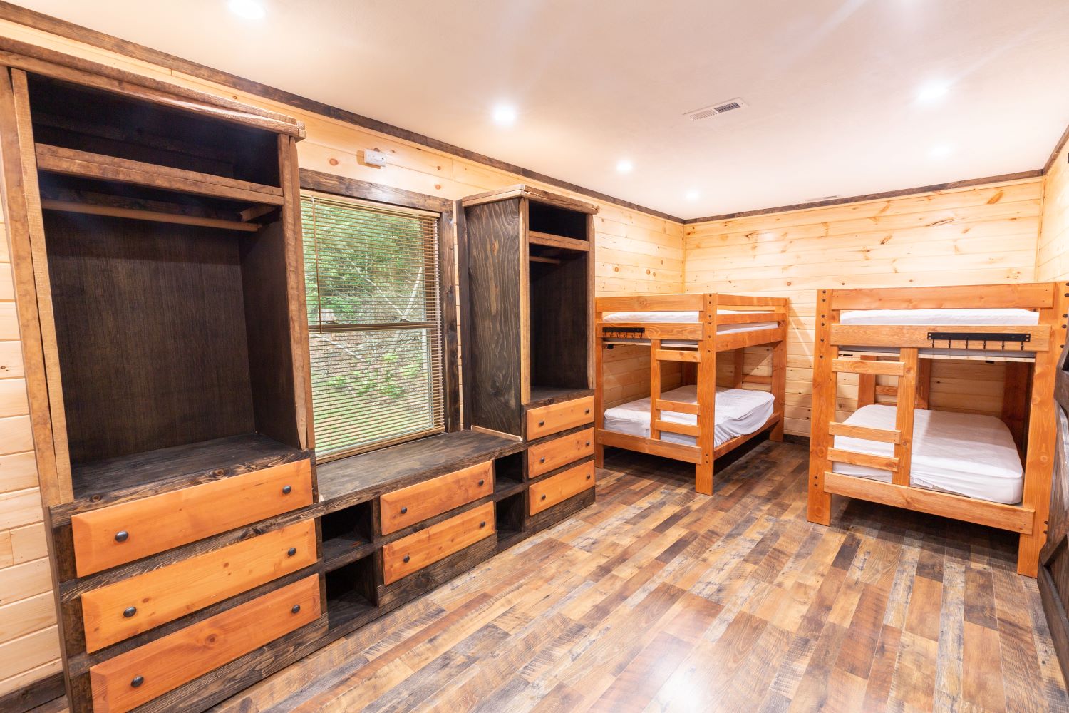 image of bunk beds in room at bunkhouse cabin