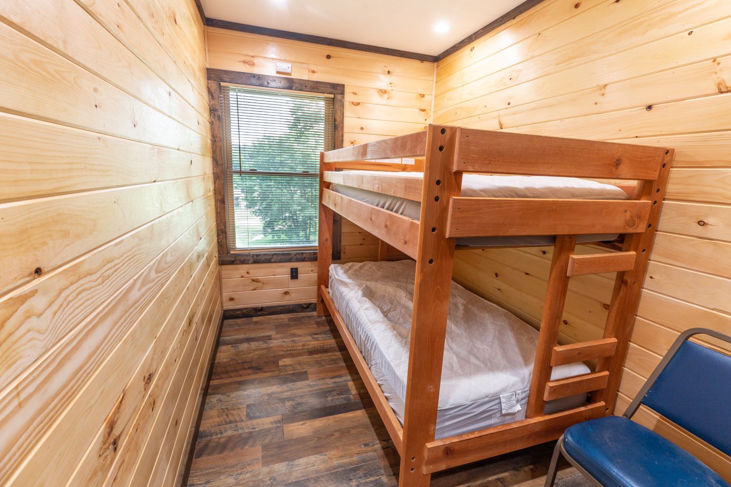 image of bunk beds in small room at bunkhouse cabin