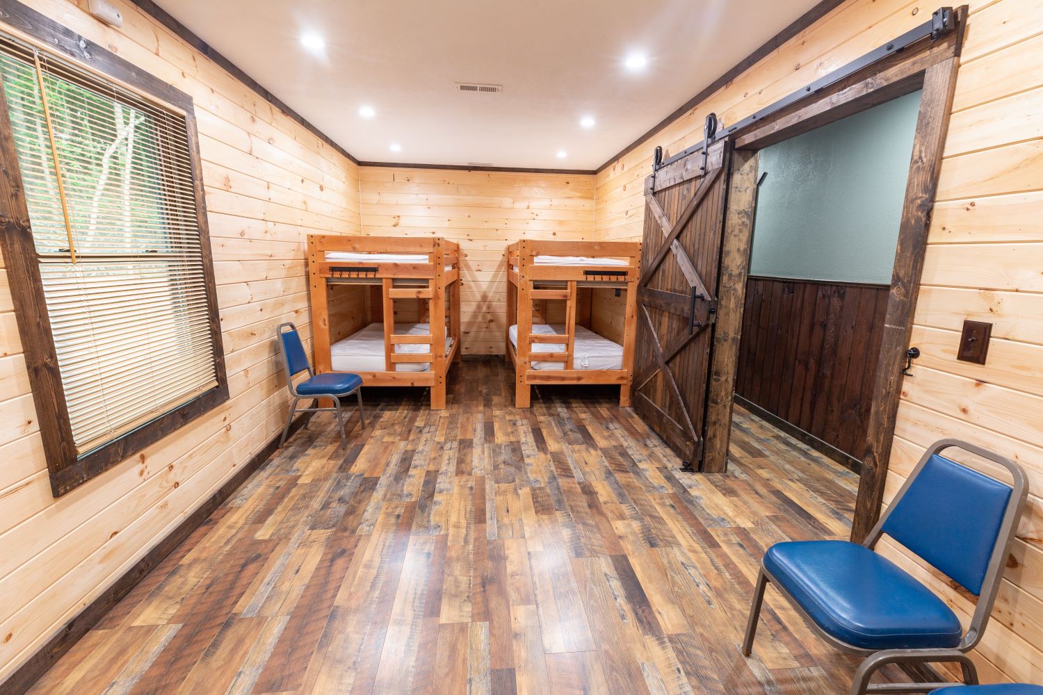 image of bunk beds in small room at bunkhouse cabin