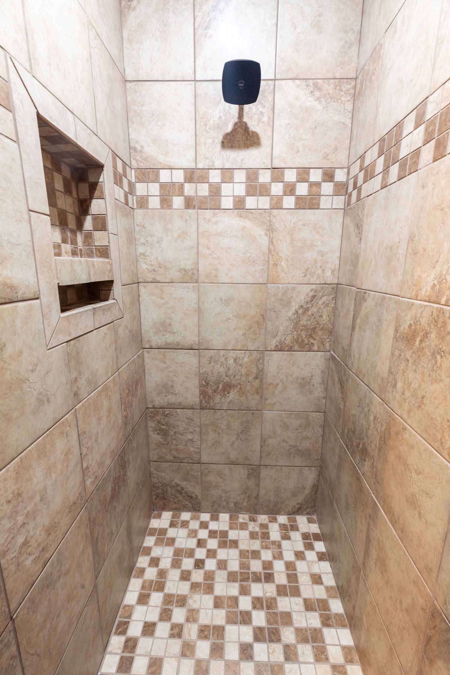 image of shower in small room at bunkhouse cabin